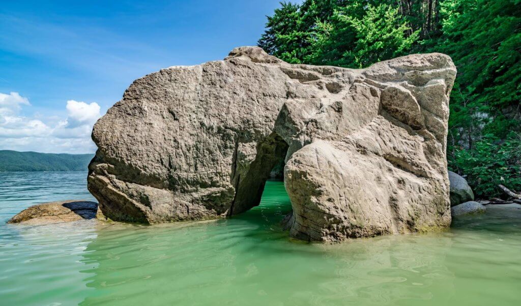 rock formation on a lake