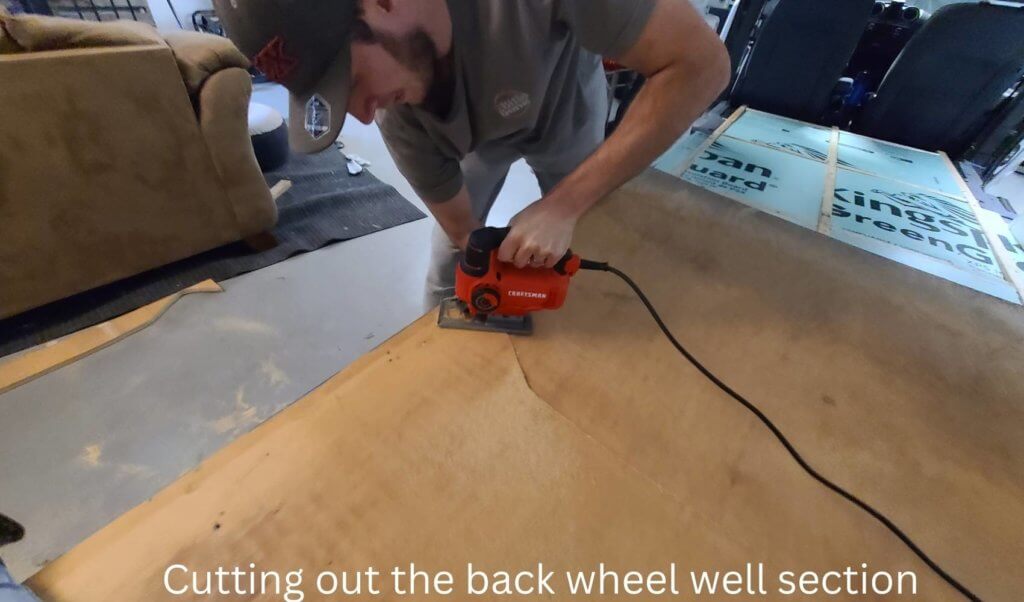 cutting out the ply wood with a jig saw