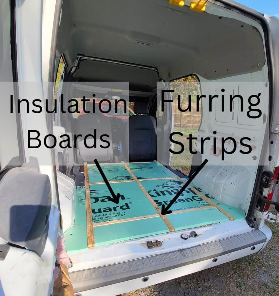 furring strips and insulation board in squares underneath camper van subflooring