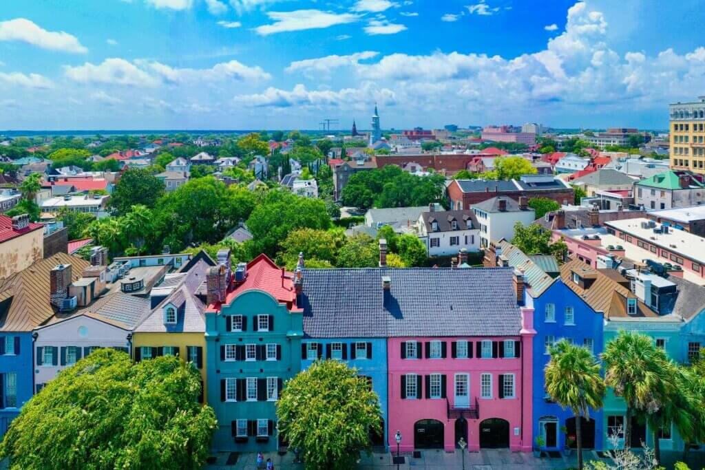 Overhead view of different colored houses at Rainbow Row in Charleston SC