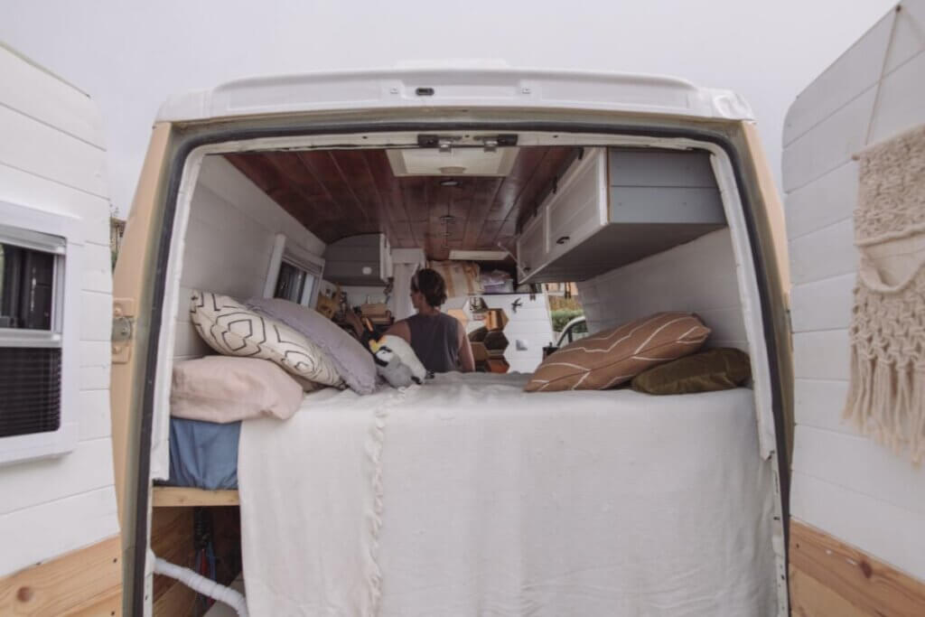 back of a camper van with bed 