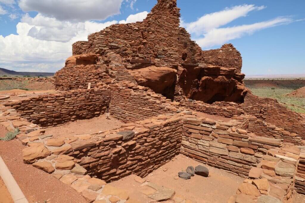 Wupatki National monument in Arizona. Red sand and bricks as part of ancient ruins