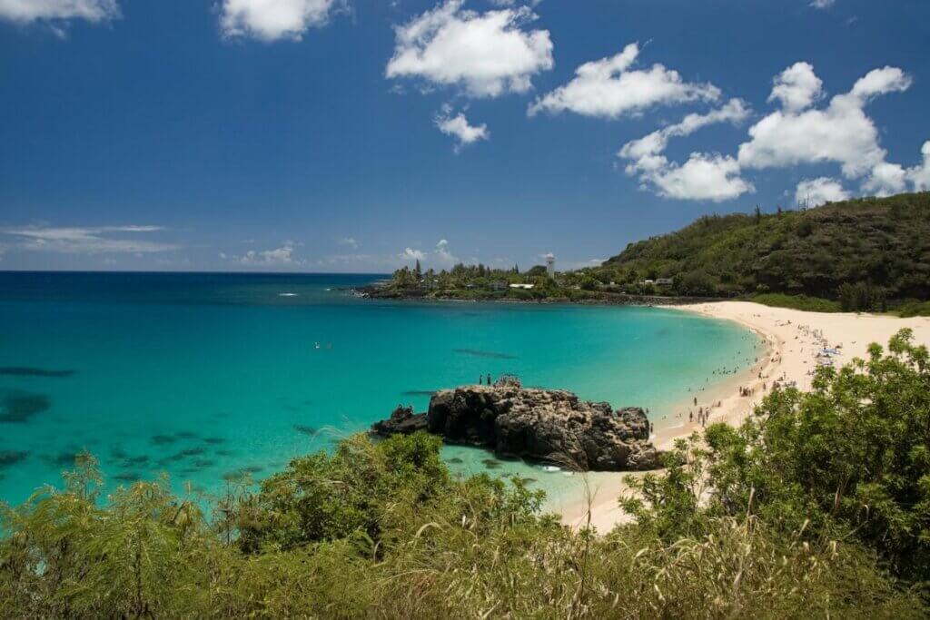 side view of Waimea Bay while the water is calm