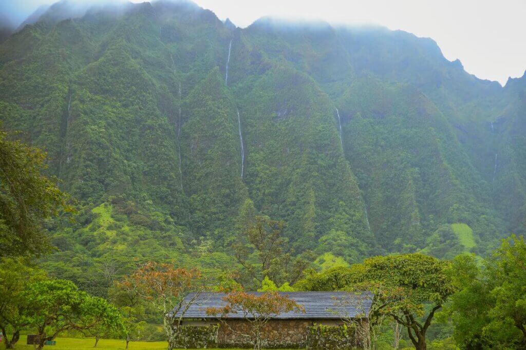 a view of ridge mountains with waterfalls in Ho'omaluhia Botanical Garden