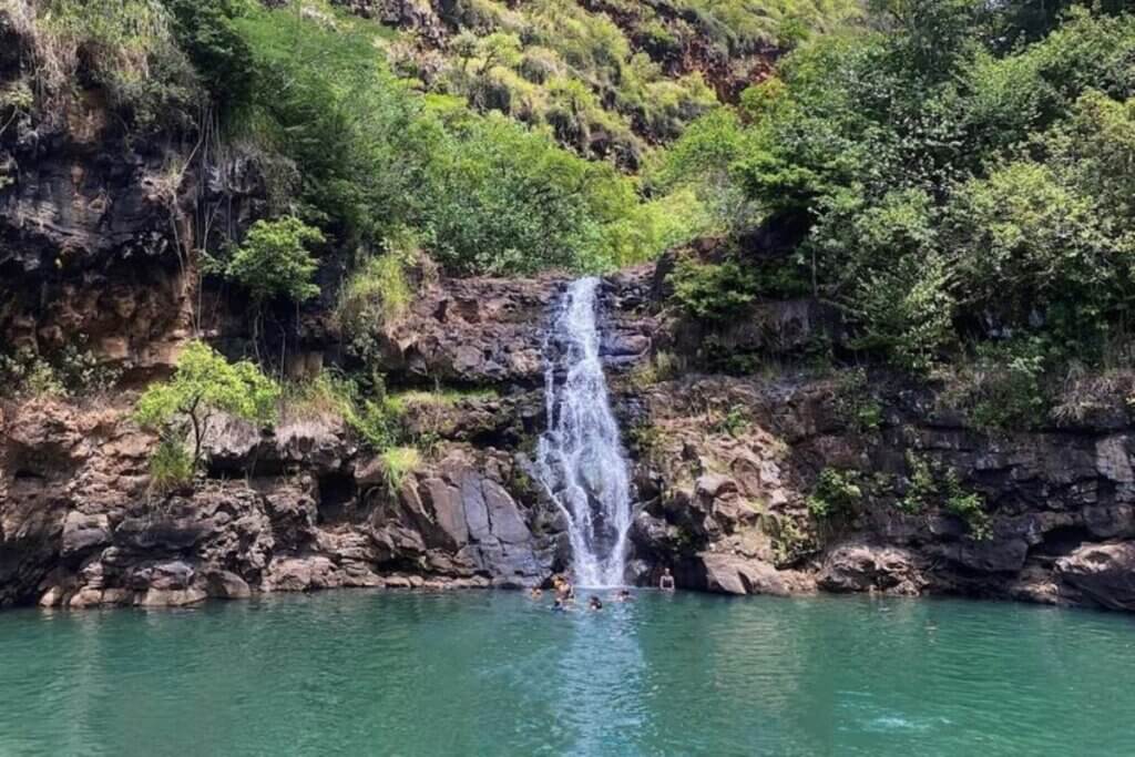 swimming in a Oahu waterfall