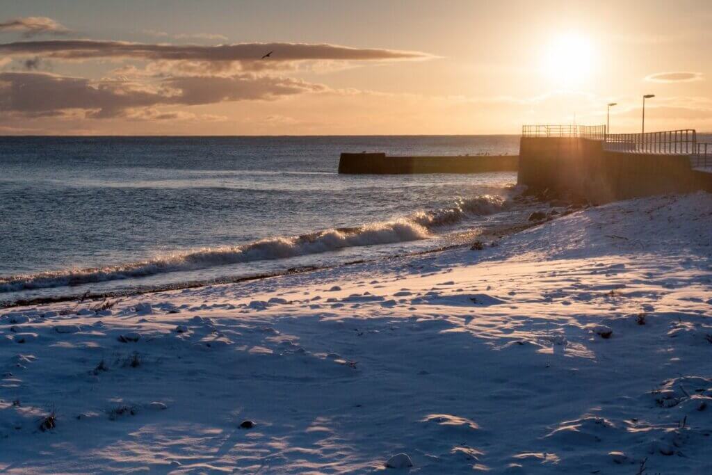 Snow on a beach during the winter months