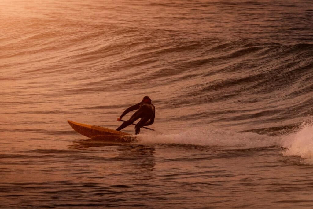 surfing in the winter with a wet suit on